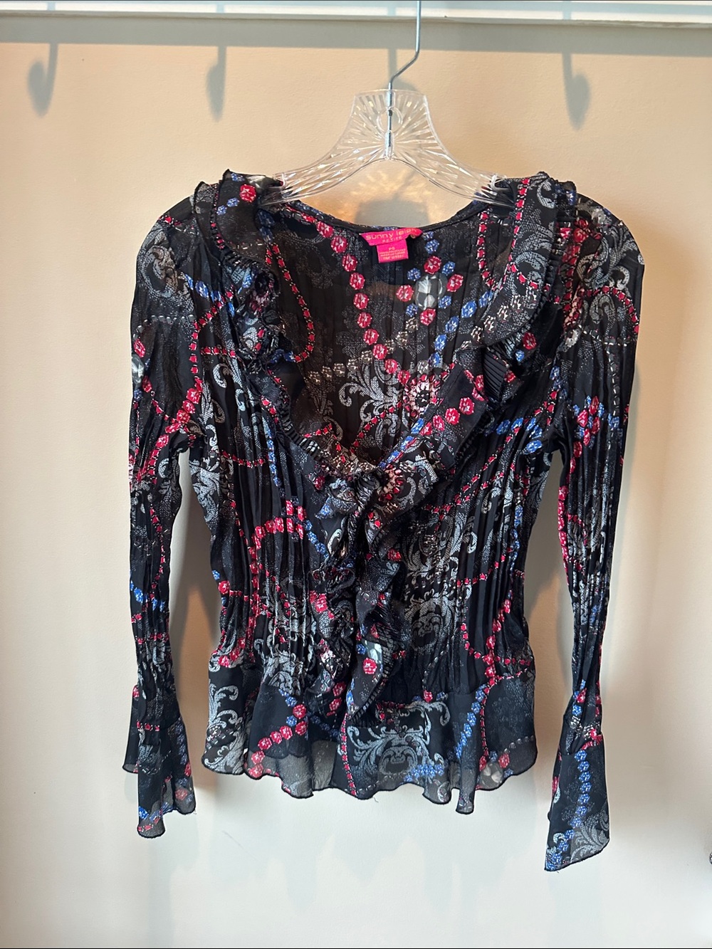 Sunny Leigh Black Sheer Ruffle V-Neck Blouse with Pink & Blue Accents